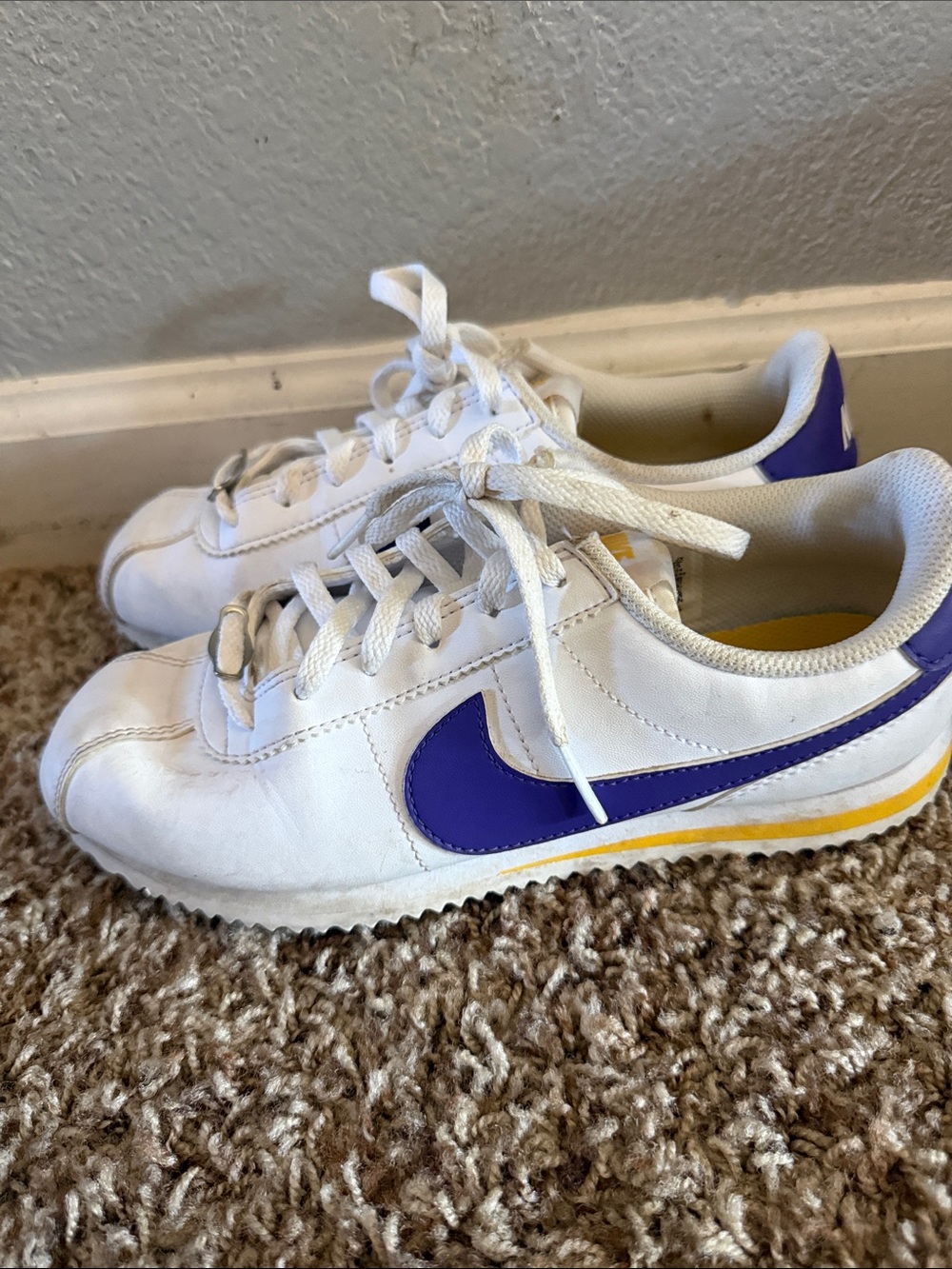 Nike White Sneakers with Purple Swoosh and Yellow Stripe